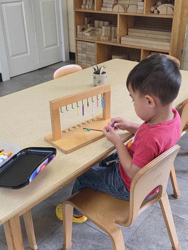 A child exploring hands-on materials